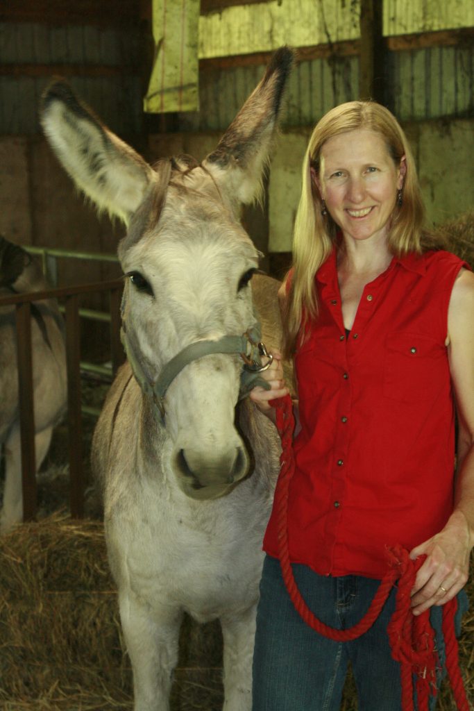 Bonnie Jo Campbell with a donkey
